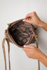 Braids and A Tassel Bag