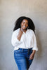 Every Girl's Go-To White Button Down
