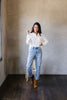 Every Girl's Go-To White Button Down