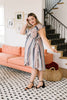 Striped Delight Ruffled Wrap Dress